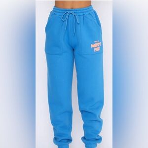 azure and pink colored white fox cuffed sweat pants